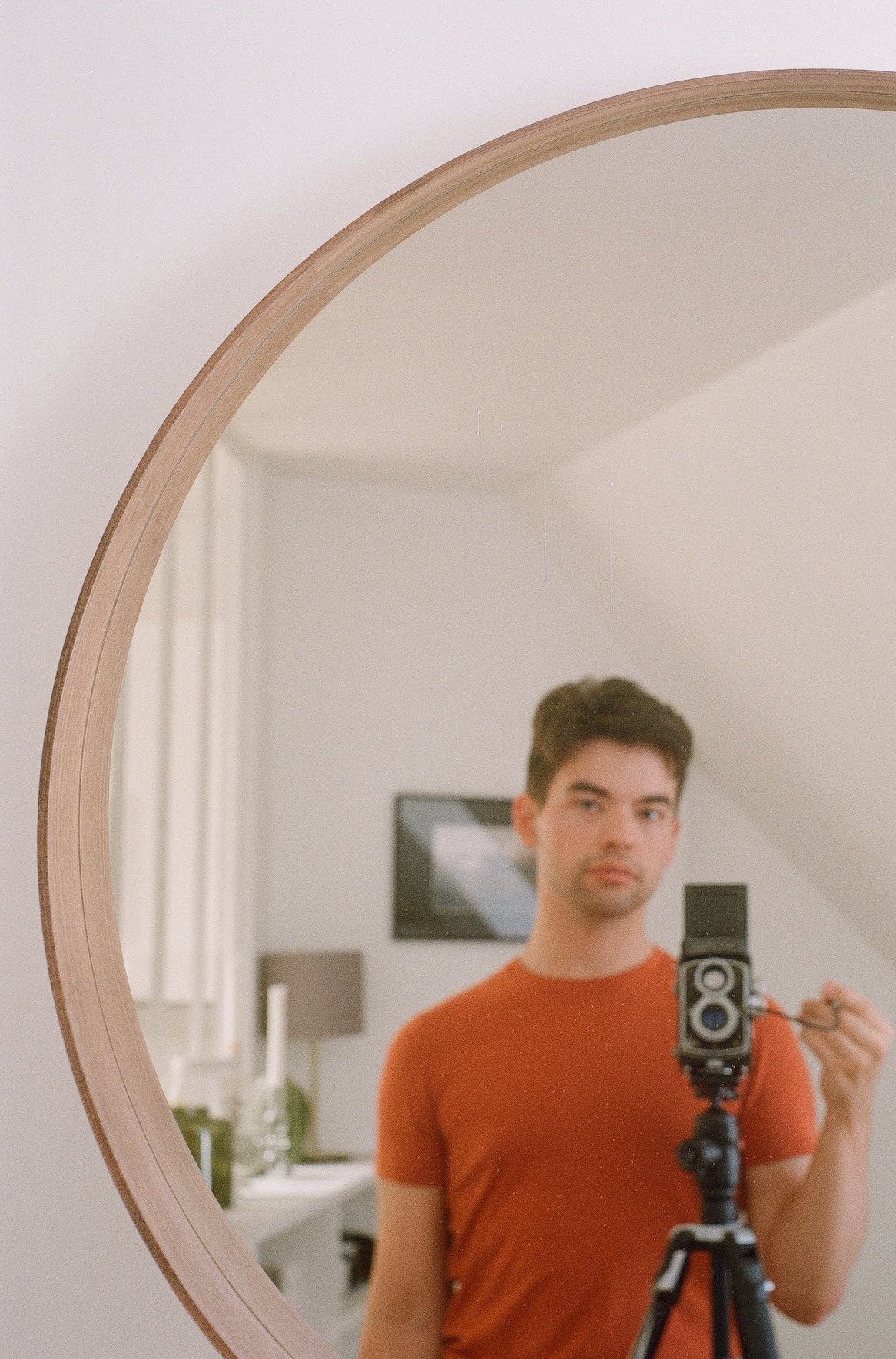 Photo in front of my mirror with one of my vintage cameras